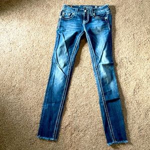Miss Me size 26 signature cuffed skinny jeans with frayed hem.